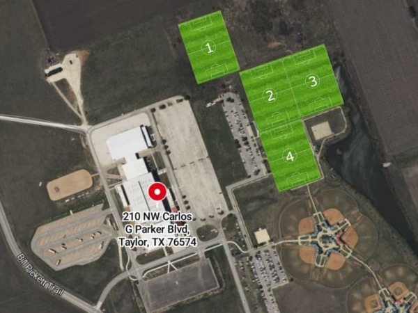 Aerial view of a sports complex at 210 NW Carlos G Parker Blvd in Taylor TX with multiple fields marked.